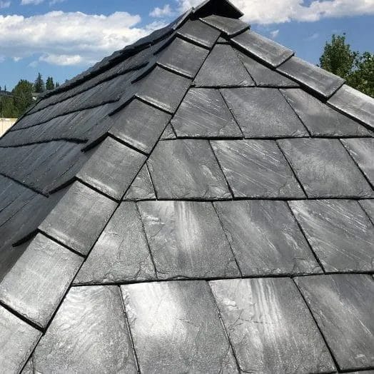 Rubber roofing shingles