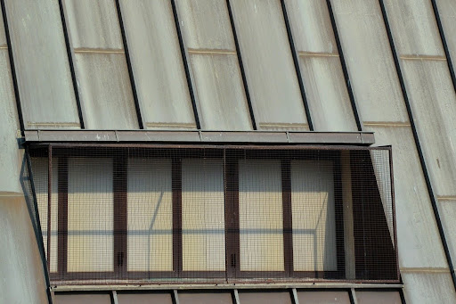 A modern metal roof with a slanted design.